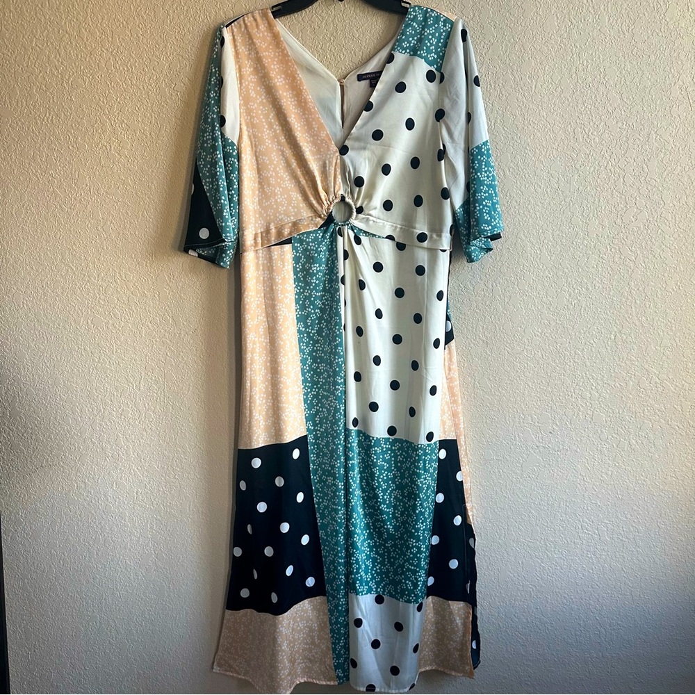 Fun flowy satin midi green, black, cream and polka dot floral patchwork design.
